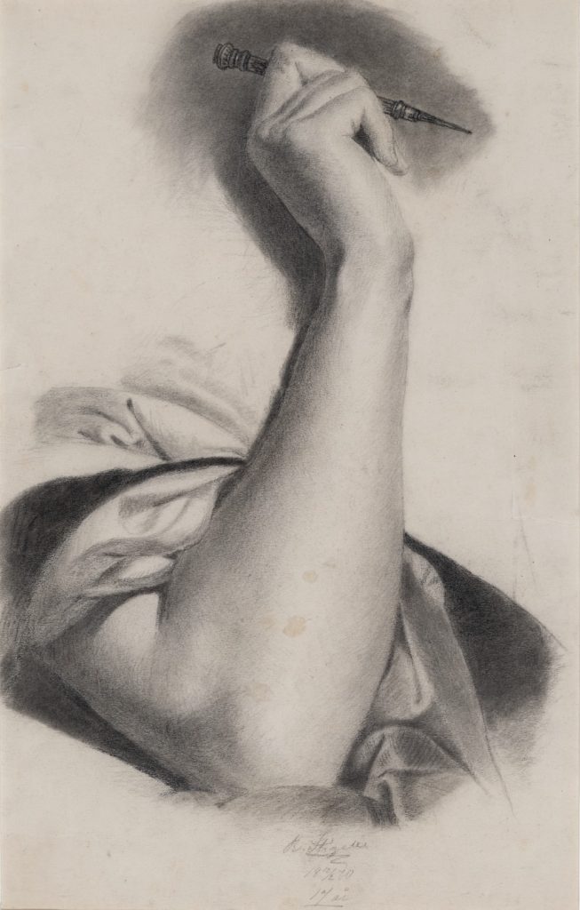 Piirros kädestä, mikä pitää kynää. 