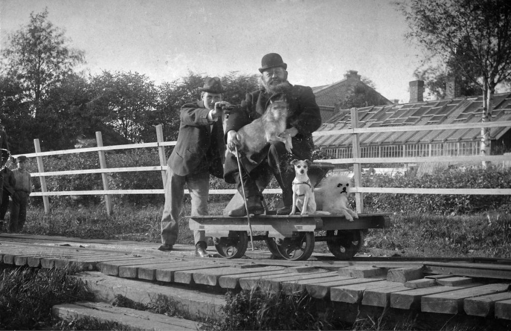 G. A. Serlachius on a board of a draisine.  Vapriikki Photograph Collection.